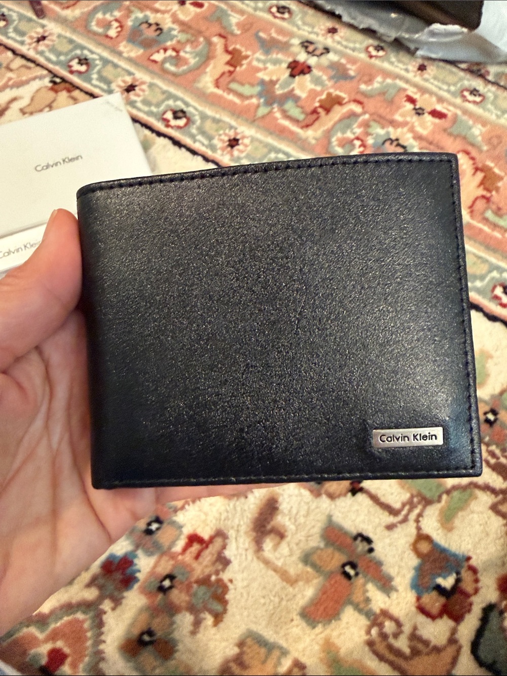 Calvin Klein Black Leather Men's Bi-Fold Wallet with Metal Logo